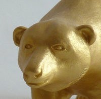 Bulle und Bär Skulpturen Keramik in Goldfarbe